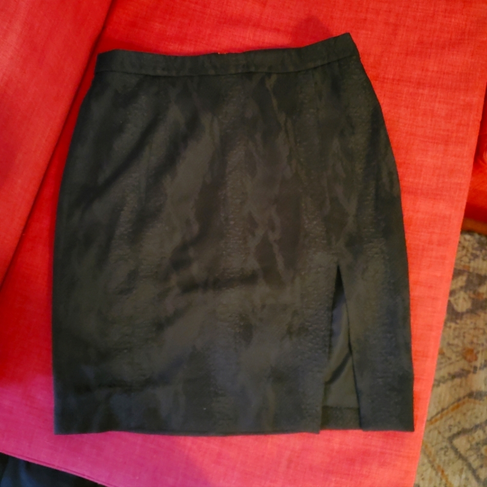 Beautiful new black shirt with slit